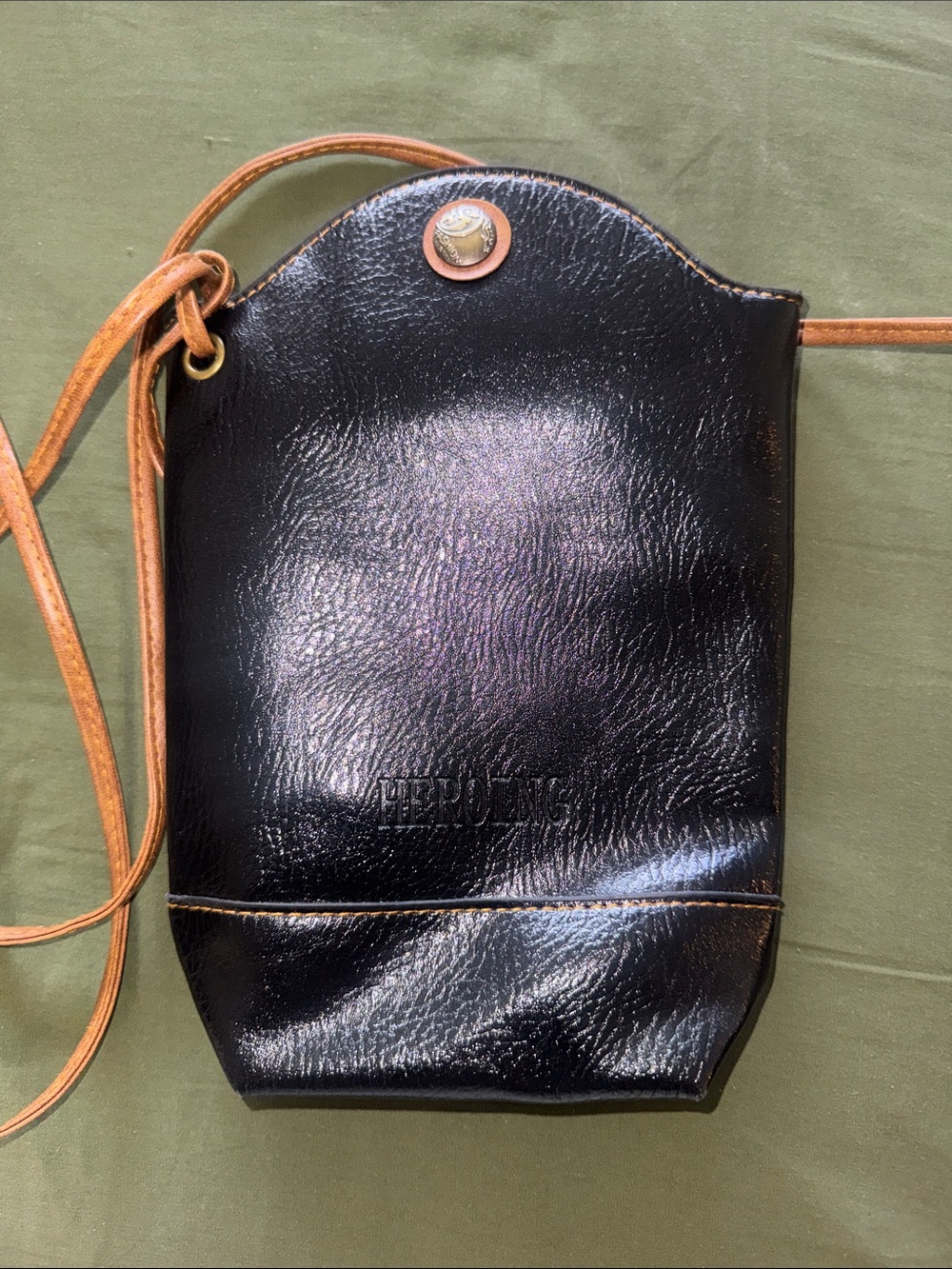 Heroing Black Leather Crossbody Pouch with Tan Strap